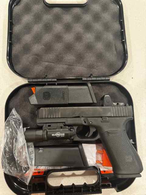 Glock 21 .45 ACP with accessories. 