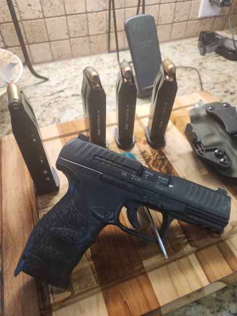 Walther PPQ 45acp with night sights. 