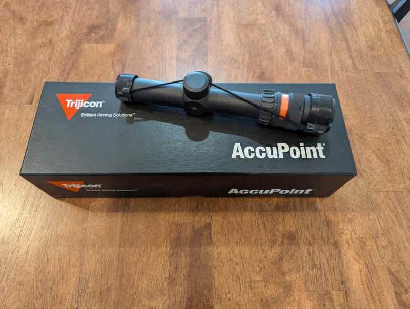 Trijicon Accupoint 1-4x with Red Chevron reticle 