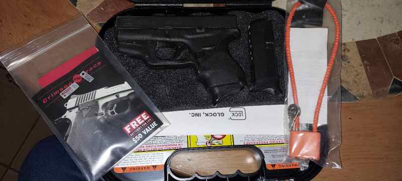 GLOCK 42, w/Crimson Trace LaserGrip, IWB leather
