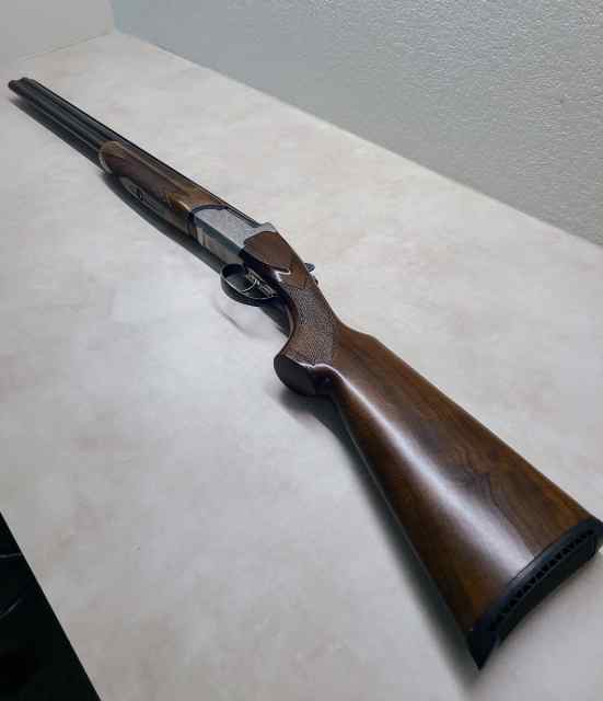 Over Under 20 G. Double Barrel Shotgun