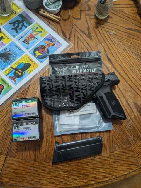 Ruger 5.7 w/ new pocket holster and 40rds Hornady