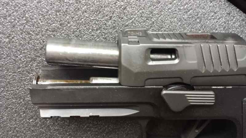 P320 AXG slide back.jpg