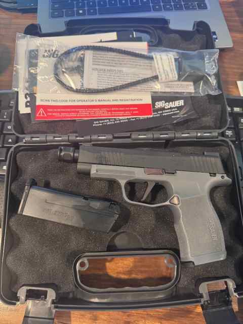 Grey Sig Sauer P365XL with threaded barrel &amp; comp