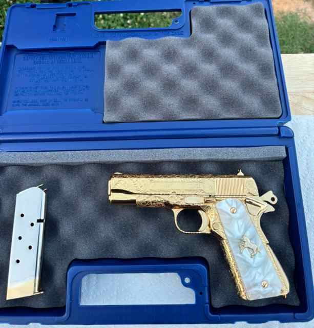 Hand engraved Colt 45acp commander 