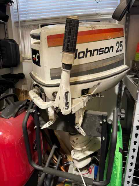 25hp Johnson Outboard Electric Start w/stand